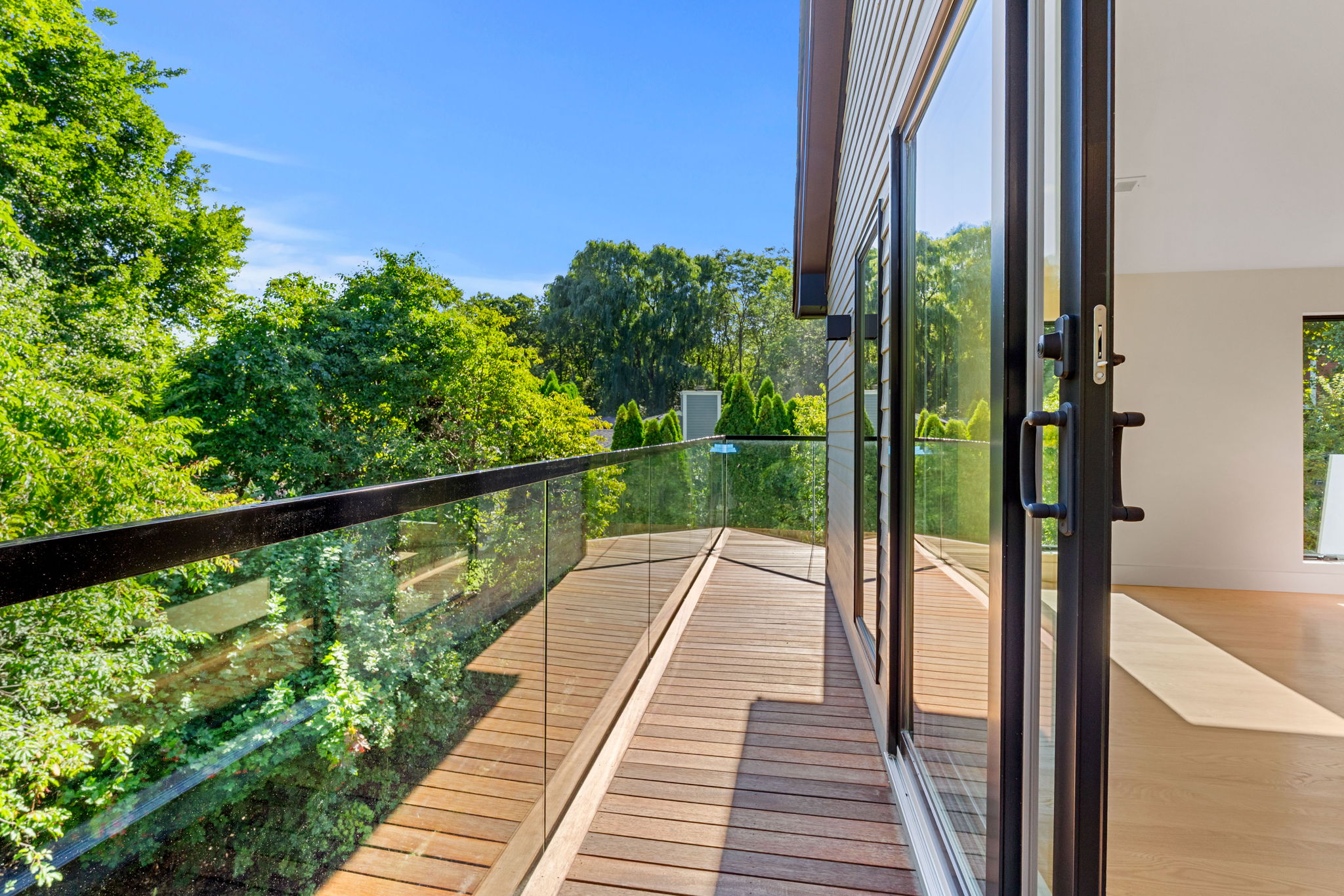 Exterior balcony and outdoor living space on a completed Kellogg Construction project